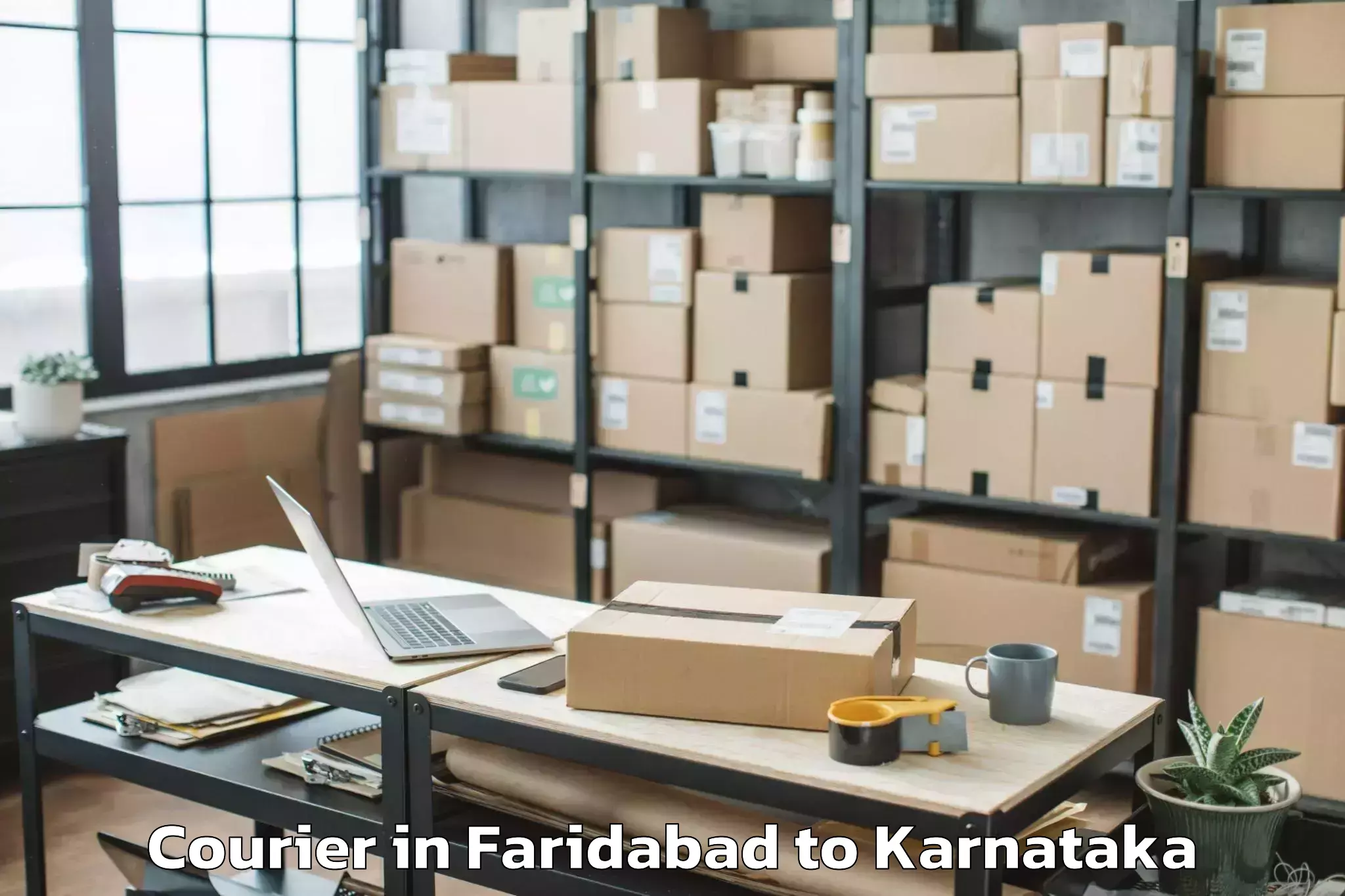 Trusted Faridabad to Maddur Courier